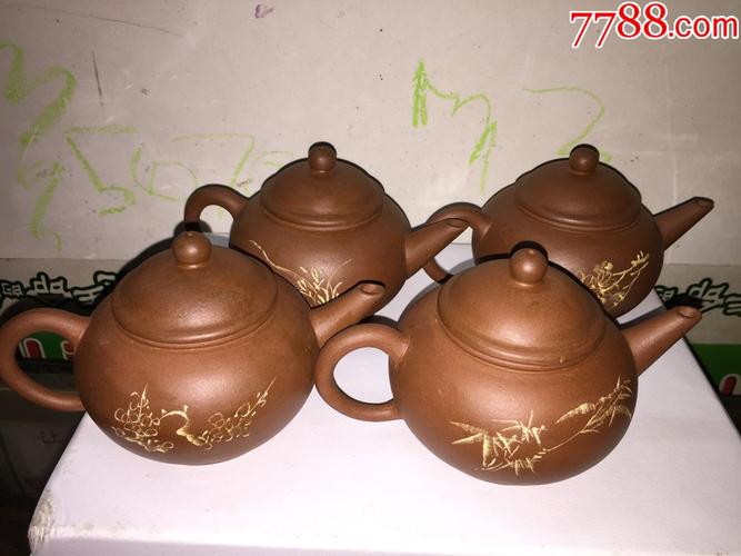 石生作梅兰竹菊紫砂壶