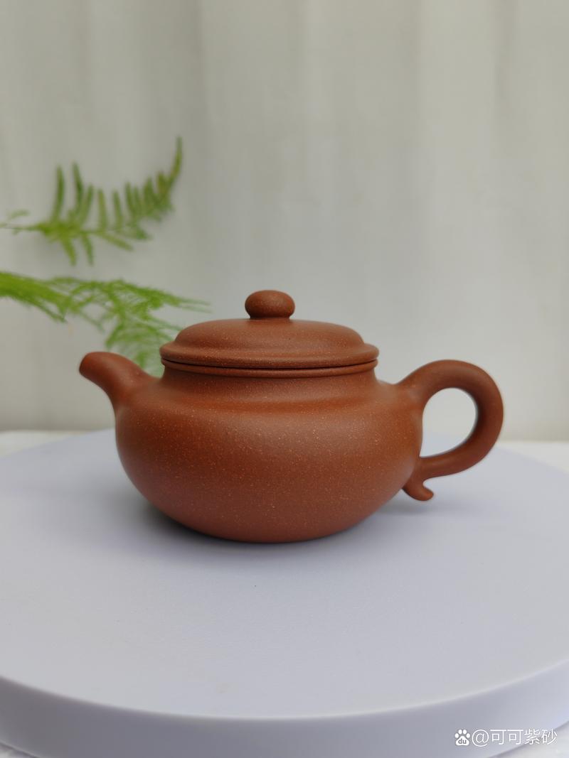 我的紫砂壶是深褐色的