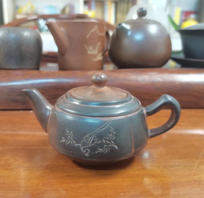 紫砂壶比坭兴陶壶好吗