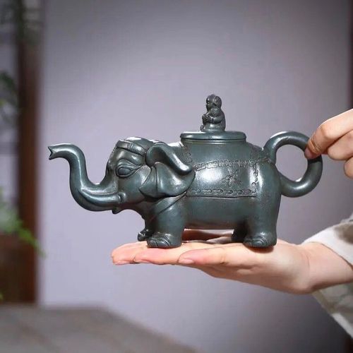 壶把是个大象的紫砂壶