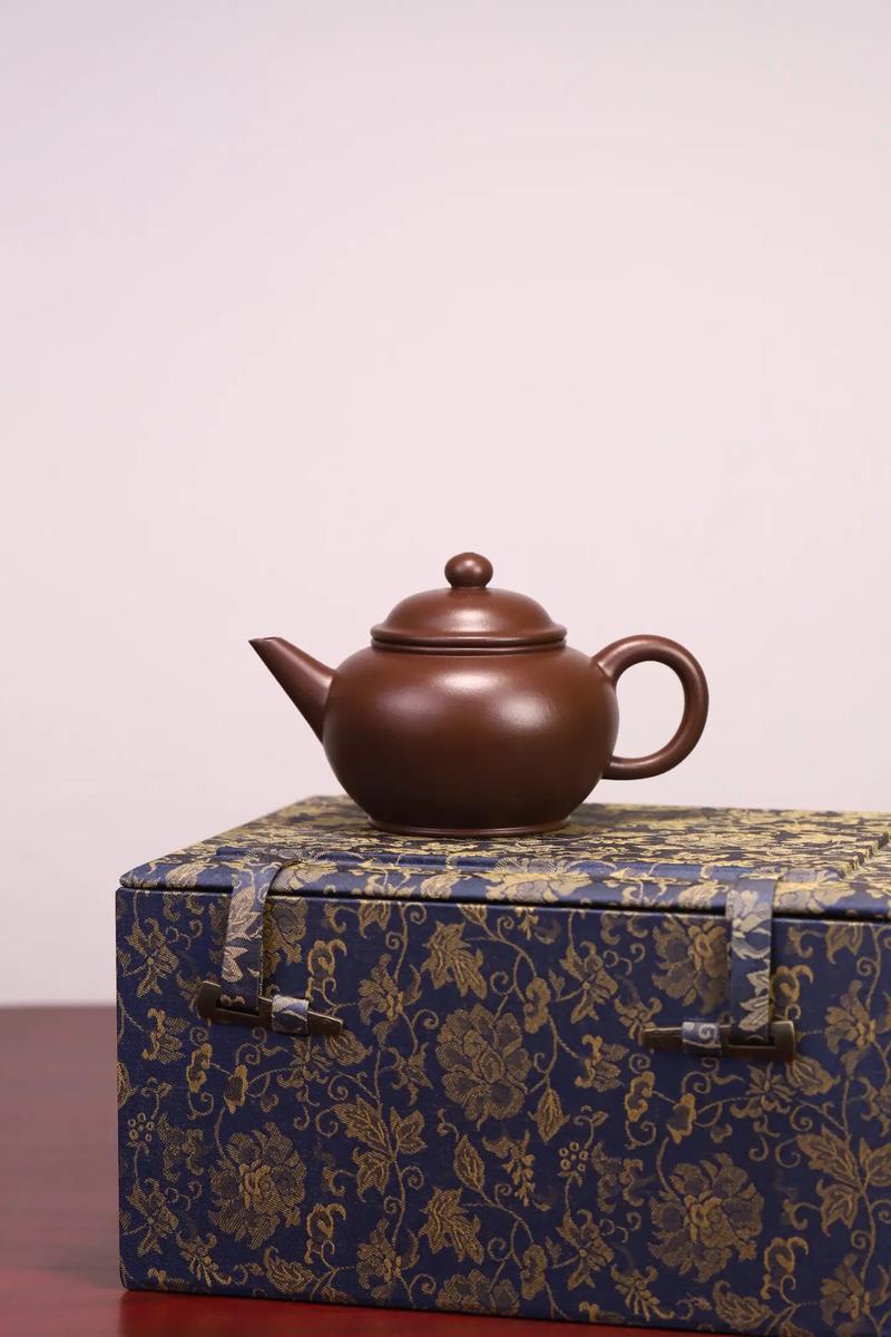 紫砂壶表面的水干得快