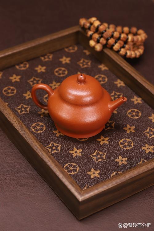紫砂壶表面的水干得快