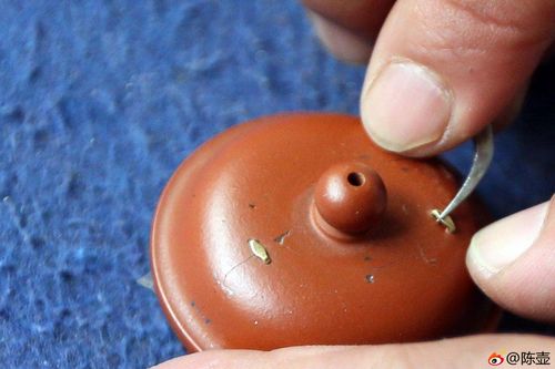 紫砂壶裂开了如何修复