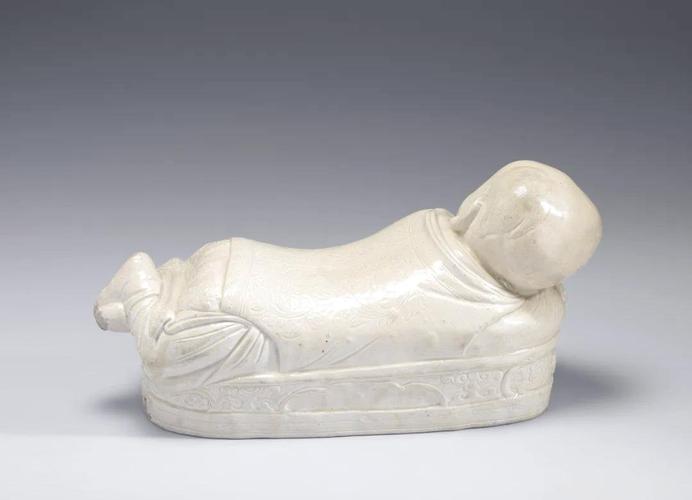 宋定窑瓷器孩儿枕鉴定