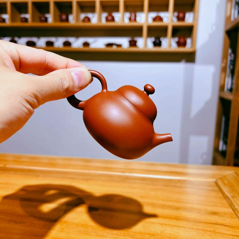 紫砂壶可以用手把玩吗