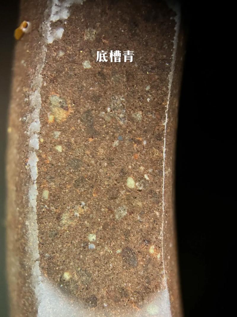 放大镜下的紫砂壶图片