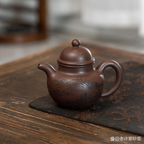 我的紫砂壶上有个小坑