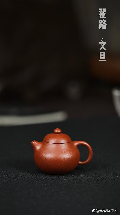 无锡周鸿根紫砂壶简介